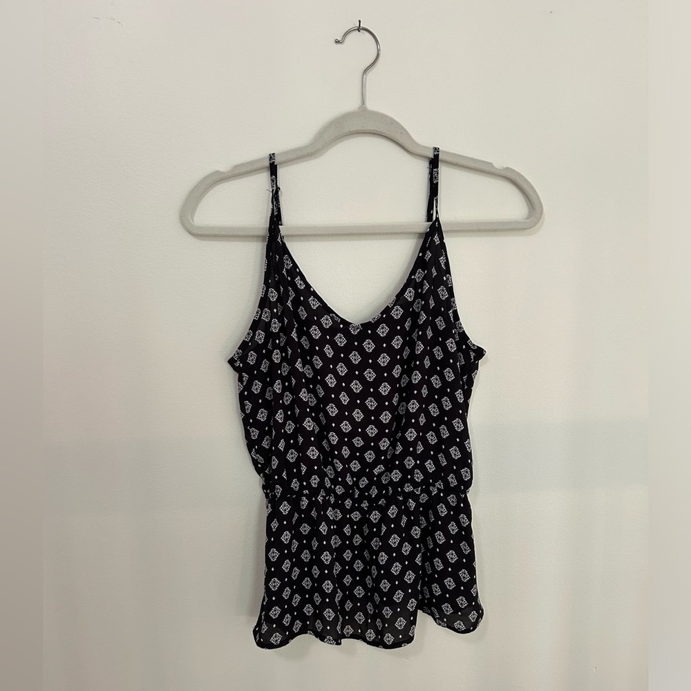 Forever 21 black thin strapped tank that cinches in the waist